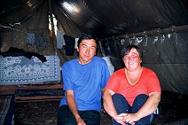 Husband and wife inside tent
